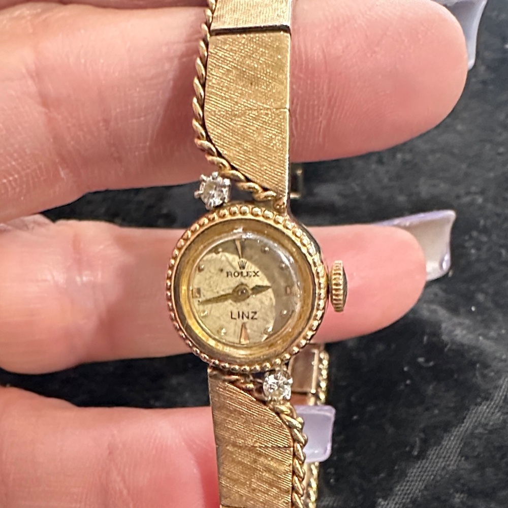 Rolex Vintage Women's Gold Watch with Diamond Accents